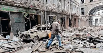  ?? | SERGEY BOBOK AFP ?? A BUILDING damaged by shelling by Russian forces in Ukraine’s second-biggest city of Kharkiv on Thursday.