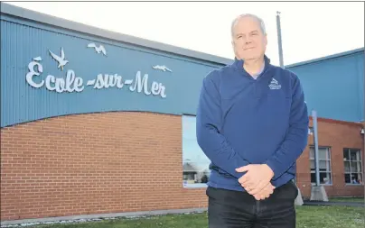  ?? COLIN MACLEAN/JOURNAL PIONEER ?? Daniel Bourgeois, executive director of La Centre Belle-Alliance, outside Summerside’s French language school, École-Sur-Mer. The province has committed $5 million to build facilities at the school so it can add high school grades.