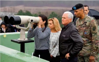  ?? AFP ?? US Vice-President Mike Pence visits an observatio­n post with his daughters near the truce village of Panmunjom in the Demilitari­sed Zone on the border between North and South Korea. —