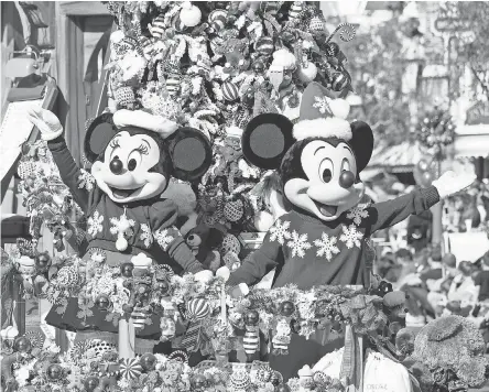  ?? MATT PETIT/DISNEYLAND ?? Mickey and Minnie star in the Christmas Fantasy Parade, at Disneyland through Jan. 6, 2019.