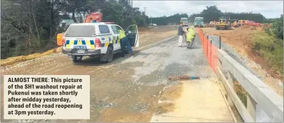  ??  ?? ALMOST THERE: This picture of the SH1 washout repair at Pukenui was taken shortly after midday yesterday, ahead of the road reopening at 3pm yesterday.