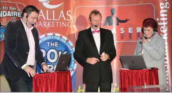  ??  ?? Quizmaster George McGrath rolling out the questions to contestant Helen O’Dea and Councillor John Paul O’Shea in his role as ‘The Chaser’.