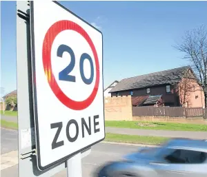  ?? Picture: Kris Miller. ?? A 20mph limit on a street in Dundee. Charity Brake argues that forcing drivers to slow down would improve safety.