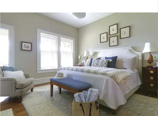  ??  ?? SERENE DREAMS. Jennifer used a darker neutral wall color for the master bedroom. “The blues relate back to the original blue accent tile in the adjoining master bathroom,” she says. “I used off-white linen cafe curtains in the bedrooms and bathrooms.”