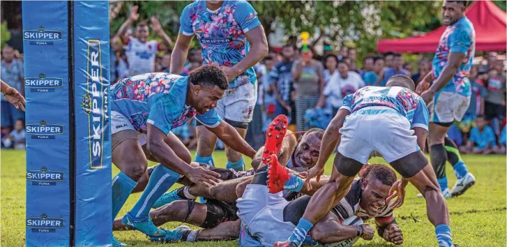  ?? Photo: Leon Lord ?? Rewa centre Taito Rauluni scores their first try against Rami Sami Suva side at Burebasaga ground in Rewa on April 17, 2021. Rewa lost 24-17.