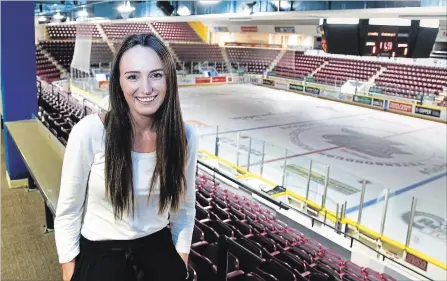  ?? CLIFFORD SKARSTEDT EXAMINER ?? Peterborou­gh Petes co-ordinator of game night operations and community events Madeline Rawson takes a break Tuesday at the Memorial Centre as she prepares for her first night running game night operations at Thursday’s home opener against the Kingston Frontenacs.