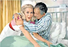  ??  ?? Non-routine check-up: June Jago and Sid James in Carry On Doctor (1967)
