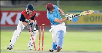  ?? Picture: RICHARD HUGGARD ?? GOT HIM: Old Grey batsman Ryan Victor is bowled while Madibaz 1 wicketkeep­er Vian Maritz looks on in the T20 Mayoral Cup final on Saturday