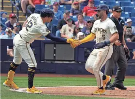  ?? RICK SCUTERI/USA TODAY SPORTS ?? Brewers centerfielder Garrett Mitchell was back in the leadoff spot Friday and hit a grand slam against the Royals.