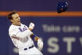  ?? MARY ALTAFFER - THE ASSOCIATED PRESS ?? New York Mets’ Michael Conforto reacts after hitting a walkoff single during the ninth inning to win the baseball game against the Washington Nationals, Friday, Aug. 9, 2019, in New York.,