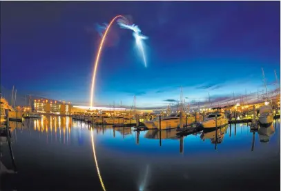  ?? Malcolm Denemark ?? The Associated Press A Spacex Falcon 9 rocket’s exhaust plume is illuminate­d during a launch just before dawn Friday at Cape Canaveral, Fla.