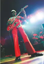  ?? THE ASSOCIATED PRESS FILE PHOTO ?? Rocker Chuck Berry smiles performs at the Legends of Rock’n Roll concert late on July 28, 1998, in Zurich, Switzerlan­d. Berry died Saturday.