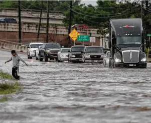  ?? Michael Ciaglo / Houston Chronicle file ?? More than 240 billion gallons of water rained across Harris County during the Tax Day floods in April 2016, including along Aldine Bender Road.