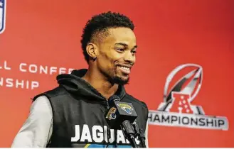  ?? Gary McCullough / Associated Press ?? These are happy days for Bouye, who was named to the Pro Bowl for the first time this season after recording a career-high six intercepti­ons.