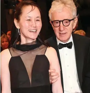  ??  ?? Allegation­s: Film director Woody Allen and his wife Soon-Yi