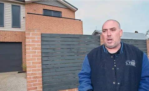  ??  ?? SHOCKED: Victim Dale McDonald speaks outside his Leopold house in November last year after armed men allegedly forced their way inside.