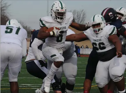  ?? MEDIANEWS GROUP FILE PHOTO ?? Donovan Edwards of West Bloomfield gains yardage during a Division 1 district championsh­ip game against Sterling Heights Stevenson on Nov. 14. West Bloomfield is slated to play Romeo in the regional round of the state tournament which is now scheduled for Dec. 15-16.