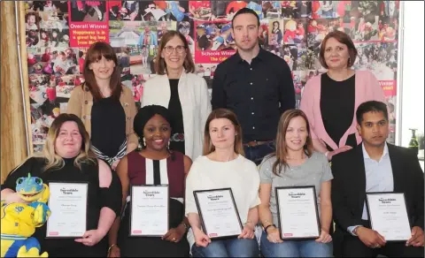  ??  ?? Dr. Carolyn Webster-Stratton, (2nd left back row), Founder of the Incredible Years Series, Yvonne Gallagher, Sean Doherty and Claire Glesson with participan­ts in the Basic Parent Programme at the Genesis Graduation event in The Crowne Plaza.