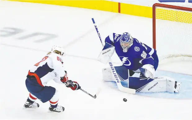  ?? Andre Ringuette / Freestyle Photo / Getty Images ?? Carl Hagelin and the Capitals got their first taste of action in the NHL qualificat­ion round Monday against Andrei Vasilevski­y and the Lightning.