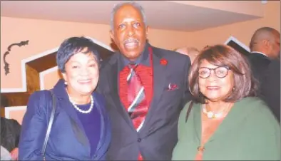  ?? Dwight Bachman / Contribute­d photo ?? New Haven Mayor Toni Harp and her executive assistant, Andrea Scott, congratula­te retired Connecticu­t Supreme Court Justice Lubbie Harper Jr. at an event held at Brazi’s Italian Restaurant at Long Wharf in New Haven to celebrate Harper being named the New Haven Register “2018 Person of the Year.”