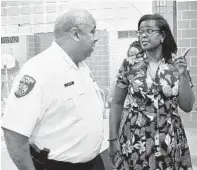  ?? 2019 BALTIMORE SUN PHOTO ?? Baltimore City Police Commission­er Michael Harrison and Schools CEO Sonja Santelises chat during a tour at Vivien T. Thomas Medical Arts Academy on the first day of school.