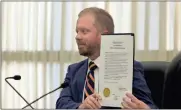  ?? Jeremy stewart ?? Cedartown City Commission Chairman Matt Foster holds up a proclamati­on during the Oct. 12 meeting of the board recognizin­g Sept. 15 through Oct. 15 as Naional Hispanic Heritage Month.