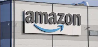  ?? Michael Sohn/Associated Press ?? The Federal Trade Commission and 17 state attorney generals filed an antitrust lawsuit against Amazon on Tuesday, alleging the e-commerce behemoth uses its position in the marketplac­e to inflate prices on other platforms, overcharge sellers and stifle competitio­n.