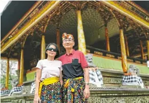  ?? ?? the writer (left) at one of the temples she and her family visited.