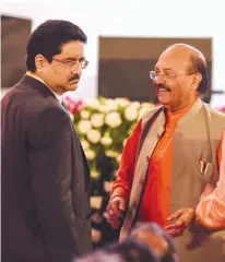  ?? — PTI ?? Rajya Sabha member Amar Singh and industrial­ist Kumar Mangalam Birla during the ground breaking ceremony where Prime Minister Narendra Modi launched various projects worth 60,000 crore, at Indira Gandhi Pratishtha­n in Lucknow on Sunday. The ceremony...