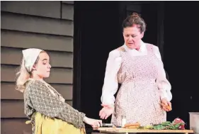  ?? PHOTOS PROVIDED BY GODDESS IMAGERY STUDIOS ?? Noa Friedman and Vickie Daignault work on cooking skills in a scene from the Sarasota Jewish Theatre production of the “The Immigrant.”