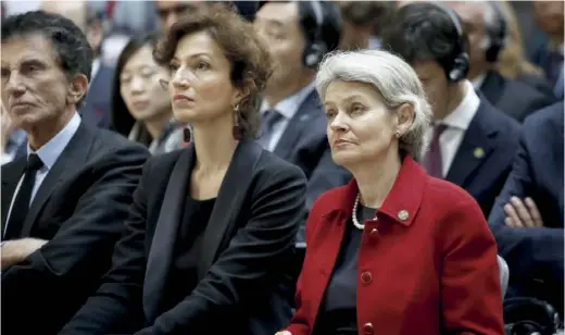  ??  ?? Audrey Azoulay, alors ministre de la Culture, aux côtés de Jack Lang, et Irina Bokova, directrice de l’Unesco, à Paris en mars 2017.