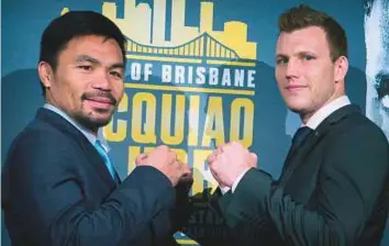  ?? AFP ?? World Boxing Organisati­on welterweig­ht defending champion Manny Pacquiao (left) with Australian contender Jeff Horn during a promotiona­l conference in Brisbane yesterday.