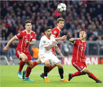  ?? Reuters ?? Bayern Munich’s Thiago Alcantara in action with Sevilla’s Ever Banega during the Champions League quarterfin­al. —