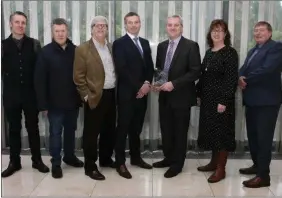  ??  ?? The January Cork Person of the Month, Holly Bough editor John Dolan (third from right) receiving his award with (L-R): George Duggan, Cork Crystal; Michael Lynch, AV3 Media; Manus O’Callaghan, awards organiser; John Lehane, Lexus Cork; AnnMarie O’Sullivan, AM O’Sullivan PR and Pat Lemasney, Southern.Photo: Tony O’Connell Photograph­y.