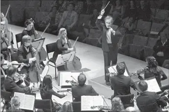  ??  ?? JAMES CONLON vigorously conducts the annual spring gala of the Colburn Orchestra.