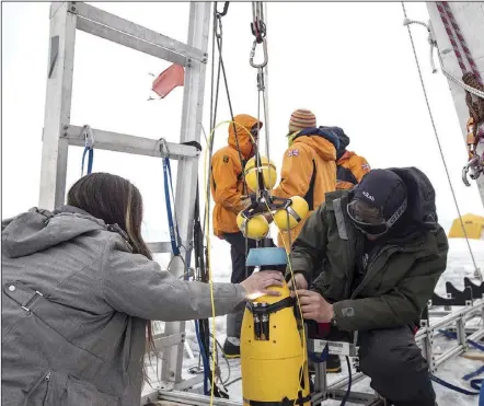  ?? Dichek / Icefin / ITGC image via AP ?? A robot nicknamed Icefin is deployed at Thwaites glacier in Antarctica in January 2020. The pencil-shaped robot is giving scientists their first look at the forces eating away at the Thwaites glacier. Two studies published Wednesday, show the rate of melting isn’t as fast as feared, but fracturing is taking the heaviest toll on the glacier.