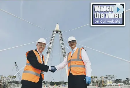  ??  ?? Northern Powerhouse Minister Jake Berry MP, right, visits New Wear Crossing with Sunderland City Council deputy leader Coun Harry Trueman.