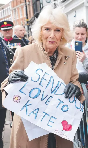  ?? ?? Camilla receives a message of support for the Princess of Wales in Shrewsbury. Picture: Getty