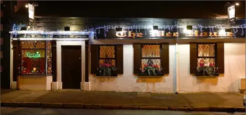  ??  ?? Some of the Christmas lights in Dundalk pubs - The Wee House.