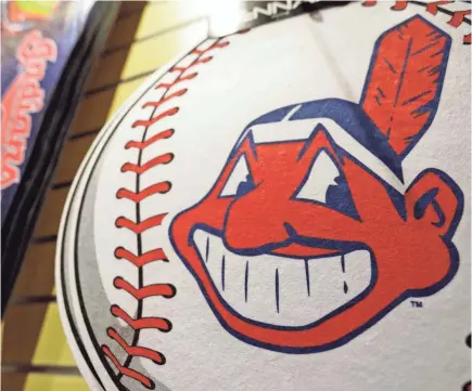  ??  ?? Divisive and hotly debated, the Chief Wahoo logo is being removed from Cleveland’s uniform next year. TONY DEJAK/AP