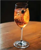  ??  ?? A refreshing, complex and delightful take on a classic Aperol Spritz