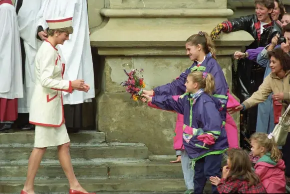  ?? KEN FAUGHT/TORONTO STAR ARCHIVES ?? Diana’s visit to St. James Cathedral in 1991. A box found in the basement of the church revealed a Bible with signatures of Diana, Prince Charles and their two boys, Princes William and Harry.