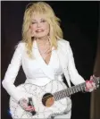  ?? ?? The Associated Press
Dolly Parton performs in concert in Nashville, Tenn.