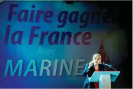  ?? — AFP ?? CALAIS: President of the French far-right Front National (FN) party Marine Le Pen delivers a speech during a campaign rally on June 8, 2017 in support of the local candidate for the upcoming parliament­ary election.