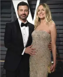  ?? EVAN AGOSTINI, THE ASSOCIATED PRESS ?? Jimmy Kimmel, left, and his pregnant wife Molly McNearney in February. Their newborn required emergency heart surgery.