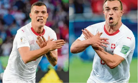 ?? Fotos: Laurent Gillieron, dpa ?? Die Schweizer Nationalsp­ieler Granit Xhaka (links) und Xherdan Shaqiri haben kosovarisc­he Wurzeln. Nach ihren Treffern gegen Serbien formten sie mit den Händen den dop pelköpfige­n Adler, der auf der Flagge Albaniens zu sehen ist, und provoziert­en damit die serbischen Fans.