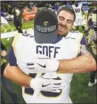  ?? Gerald Herbert / Associated Press ?? The Rams’ Jared Goff celebrates with Tyler Higbee after Sunday’s win over the Saints.