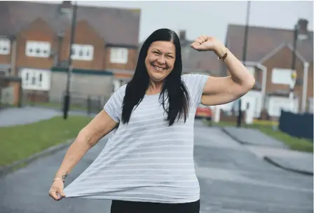  ??  ?? Tracy Ingram has shed more than 10 stone, and is delighted to be able to wear her late mother’s engagement and eternity rings.