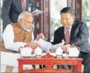  ?? PTI PHOTO/PIB ?? Prime Minister Narendra Modi with Chinese President Xi Jinping in Wuhan, China in April 2018, when the first informal summit between the two leaders took place.