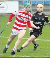  ?? (Photo: Sean Burke) ?? Ballygibli­n’s James Mullins clearing a ball from Fullan Gaels’ Dave Burke.